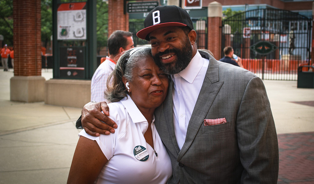 Council President Nick J. Mosby greets residents at Camden Yards. 